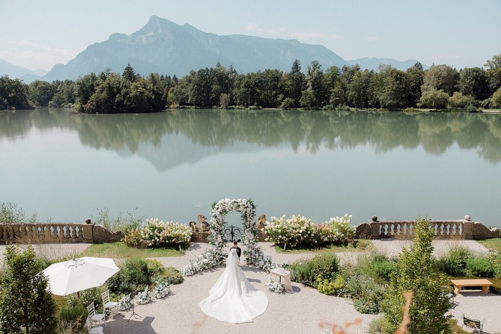 Intimate elopement ceremony overlooking lake Schloss Leopoldskron Salzburg